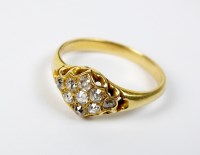 Lot 67 - A nine stone diamond cluster ring, weight 3gms