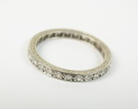 Lot 71 - A diamond set full hoop eternity ring, the...