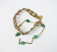 Lot 75 - A turquoise set yellow metal bracelet, stamped...