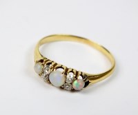 Lot 88 - An early 20th century opal and diamond ring,...