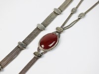 Lot 92 - A Carnelian set necklace, designed as an oval...