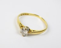 Lot 93 - An 18ct gold single stone diamond ring, the...