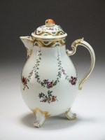 Lot 133 - A Ludwigsburg porcelain milk jug and cover,...