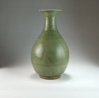 Lot 177 - A Chinese Longquan style vase, of pear form...