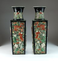 Lot 192 - A pair of Chinese biscuit famille verte double-...