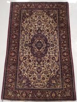 Lot 210 - A 20th century Persian Kashan blue and red...