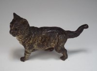 Lot 216 - An early 20th century cold painted bronze cat,...