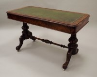 Lot 262 - A Victorian walnut veneered writing table, the...