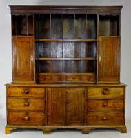 Lot 264 - An early 19th century oak high dresser the...