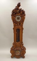 Lot 268 - A Continental walnut Louis XV style three...