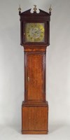 Lot 287 - A George III oak crossbanded mahogany eight...