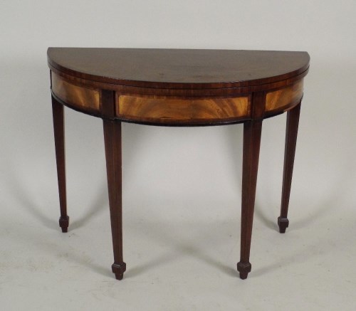 Lot 293 - A 19th century mahogany demi-lune fold over...