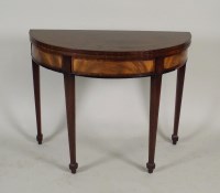 Lot 293 - A 19th century mahogany demi-lune fold over...