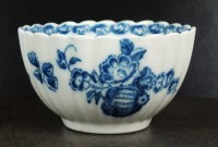 Lot 20 - A Caughley fluted tea bowl, circa 1778-88,...