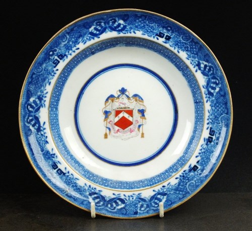Lot 57 - A Caughley armorial muffin dish, circa 1790,...