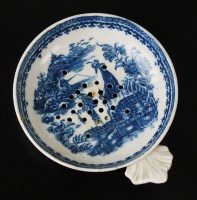 Lot 84 - A Caughley egg drainer, circa 1780, the...