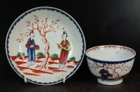 Lot 158 - A Liverpool polychrome tea bowl and saucer,...