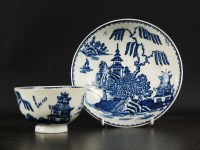 Lot 166 - A Lowestoft tea bowl and saucer, circa 1760-70,...