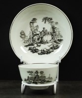 Lot 204 - A Worcester teabowl and saucer, circa 1760,...