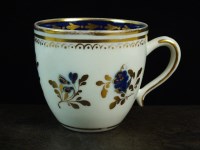 Lot 223 - A Caughley coffee cup, circa 1795, painted in...