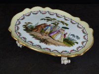 Lot 284 - A Meissen porcelain tray on four paw feet,...