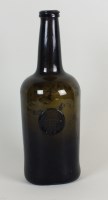 Lot 306 - A sealed cylinder wine bottle, dated 1777, the...