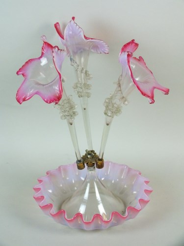 Lot 307 - A Victorian cranberry glass epergne, the...