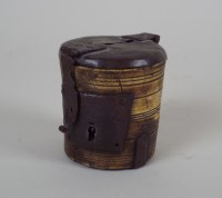 Lot 349 - A tapering circular horn money box, with...