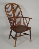 Lot 396 - A mid 19th century ash and elm wheel back...