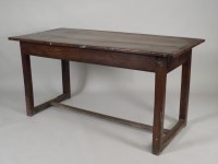Lot 397 - An 18th century oak farmhouse table, the three...