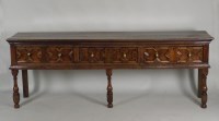 Lot 401 - A Charles II oak dresser base, the rectangular...