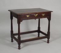 Lot 403 - An early 18th century oak side table the...