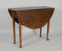 Lot 404 - An 18th century oak drop-leaf breakfast table...