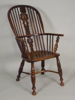 Lot 419 - A Victorian ash and elm Windsor armchair the...