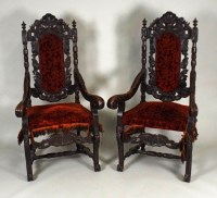 Lot 427 - A pair of Victorian oak open armchairs in the...
