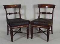 Lot 437 - A pair of Regency mahogany library side chairs...