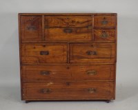 Lot 473 - A 19th century teak campaign style desk/chest,...