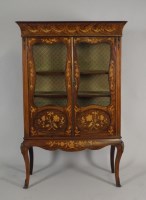 Lot 481 - A Louis XV style faux rosewood and marquetry...