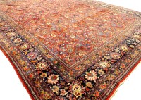 Lot 496 - A Tabriz blue and red ground carpet with...