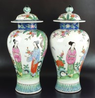 Lot 29 - A pair of Chinese porcelain baluster vases and...