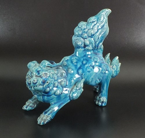 Lot 49 - A Chinese turquoise glaze bixie figure, 19th...