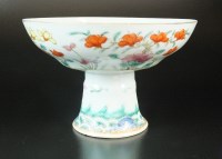 Lot 82 - A Chinese famille rose stem bowl, 20th century,...