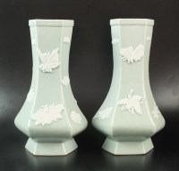 Lot 101 - A pair of pale celadon glaze bottle vases,...