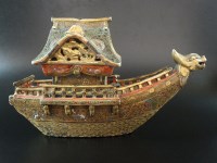 Lot 110 - A Japanese Satsuma moriage dragon boat form...