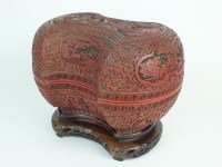 Lot 120 - A Chinese cinnabar lacquer ingot form box and...