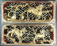 Lot 123 - Two modern gilt and red Chinese carved wooden...