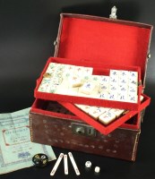 Lot 131 - A Chinese bamboo and bone Mahjong set in...