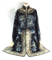 Lot 139 - A Chinese embroidered silk robe, 20th century,...