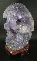 Lot 179 - A Chinese carved amethyst crystal model of an...