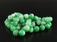 Lot 185 - A jade bead necklace, comprising seventy-four...